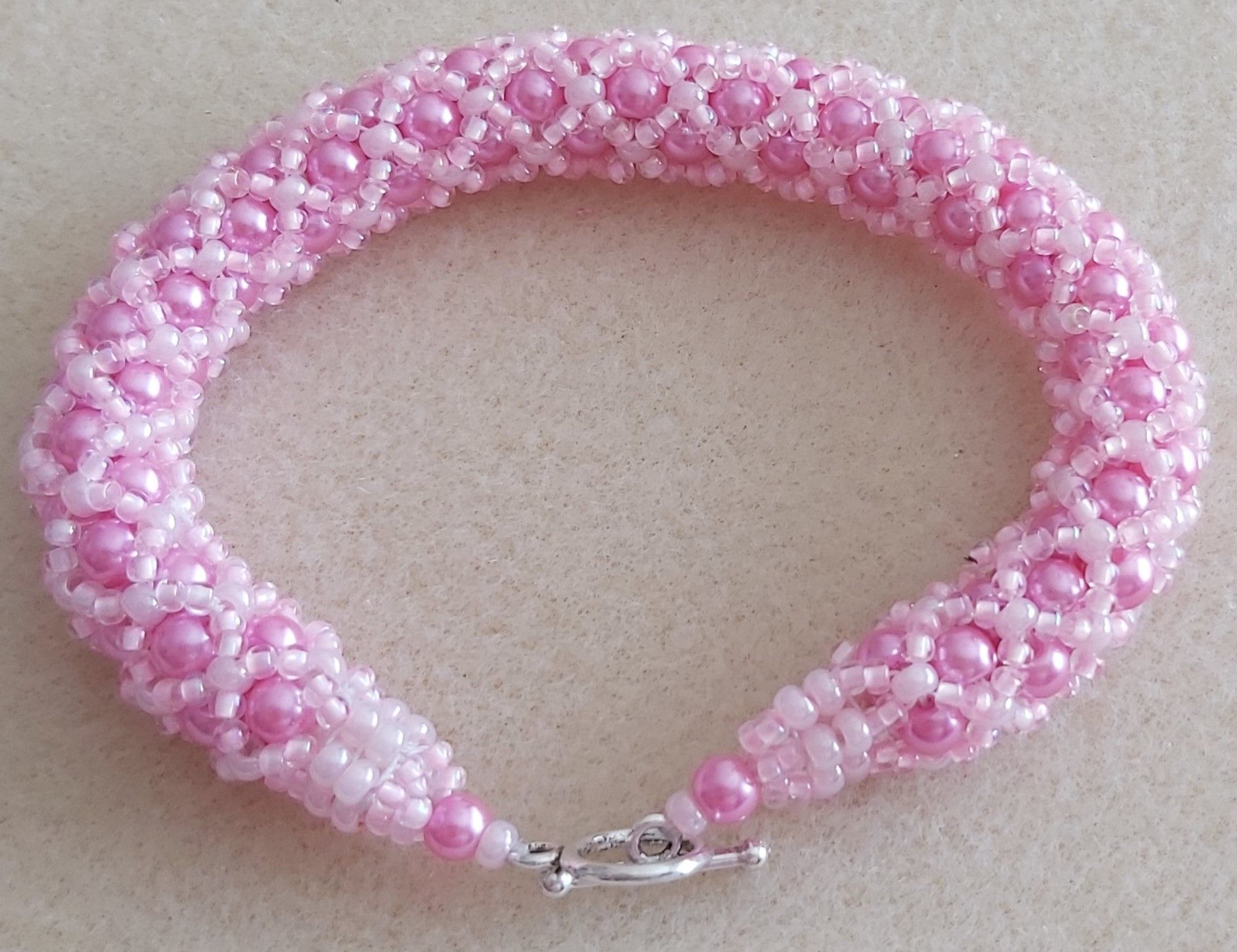 Pink Pearl Round Glass Beads and Pink Pearl seed bead Tubular netted bracelet.