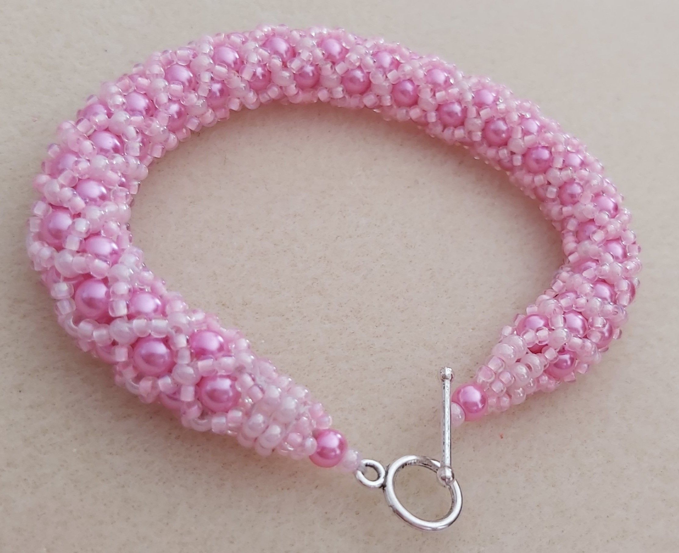 Pink Pearl Round Glass Beads and Pink Pearl seed bead Tubular netted bracelet.