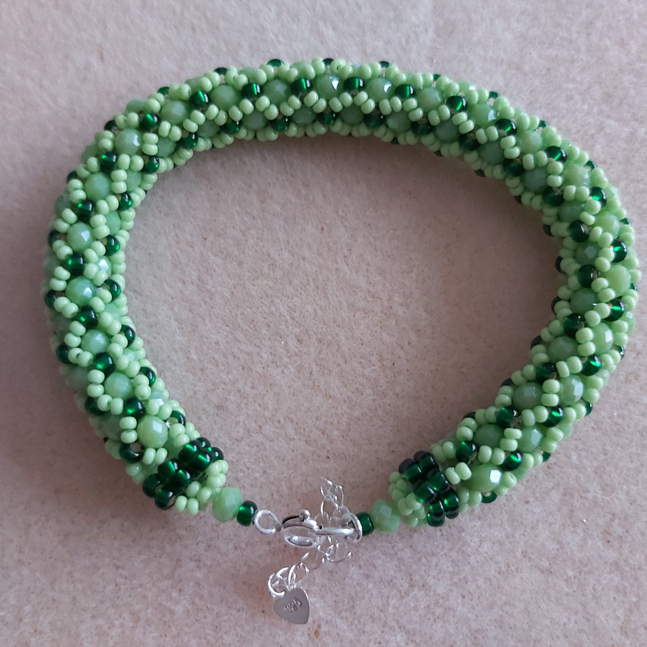 Light Green 4mm Faceted Rondelles, Miyuki Green seed beads with 925 Silver Fixings. 7.5" - 8.5"
