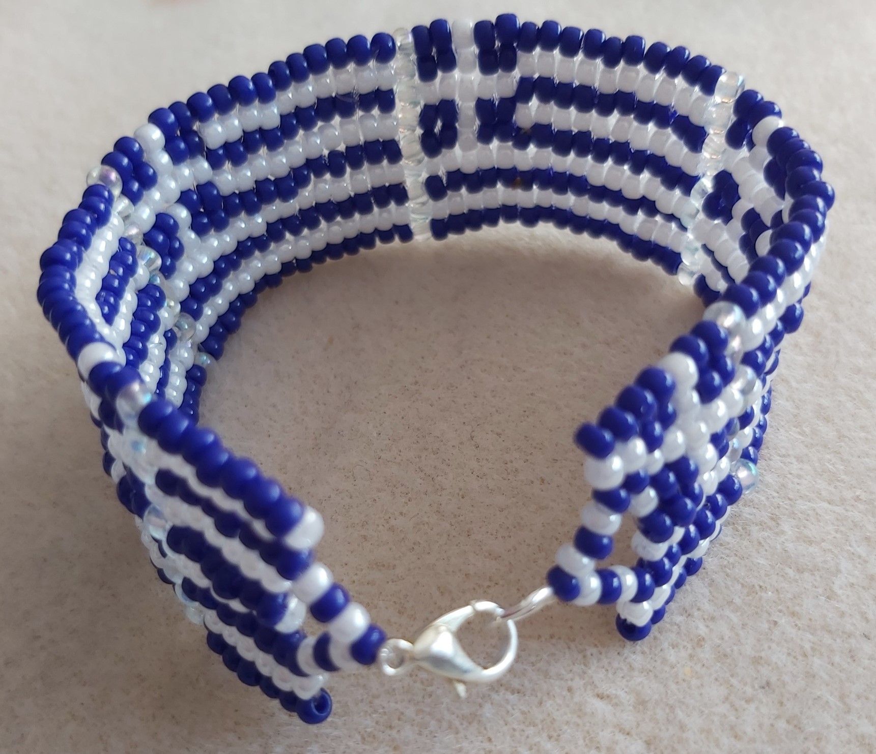 Hand Made Greek Flag Herring Bone Stitch Seed Bead Bracelet using 8/o Miyuki seed beads.  Silver Plated Clasp.