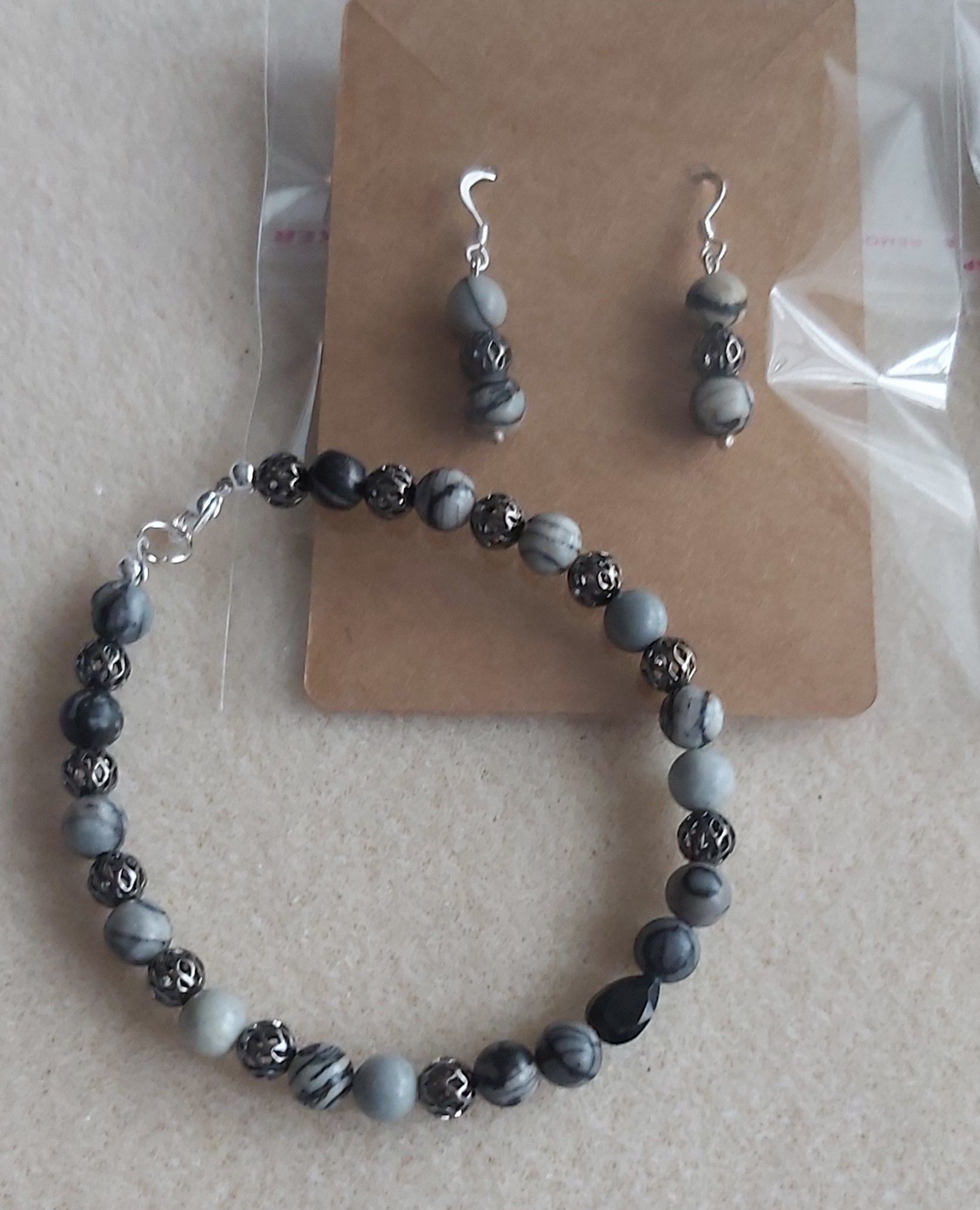 Genuine Black Picasso, black plated filigree beads and Spinel Bracelets.