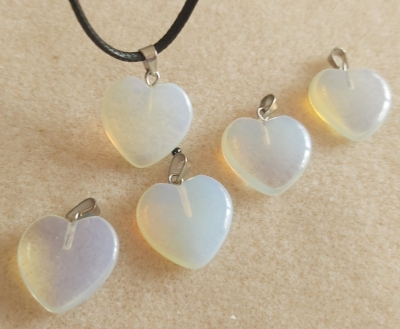 An Opalite Heart pendant with a silver plated clasp and Black cord Chain (with 2" Extension), Heart is 20mm x 20mm