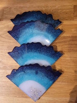 Blue and white resin coasters finished in silver