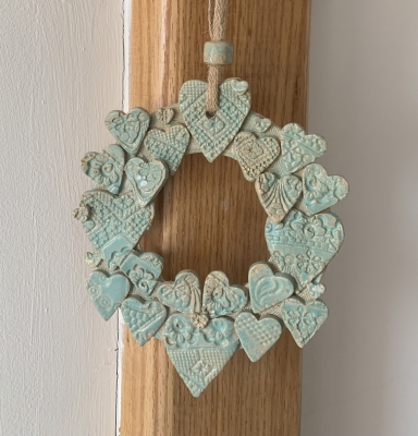 handmade-item handmade-gifts Duck Egg Ceramic Heart wreath on jute ribbon.