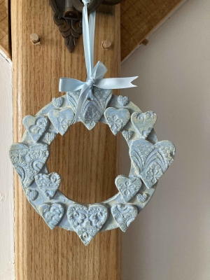 Sweet Glacier Blue Ceramic Heart wreath on satin ribbon with added bow.