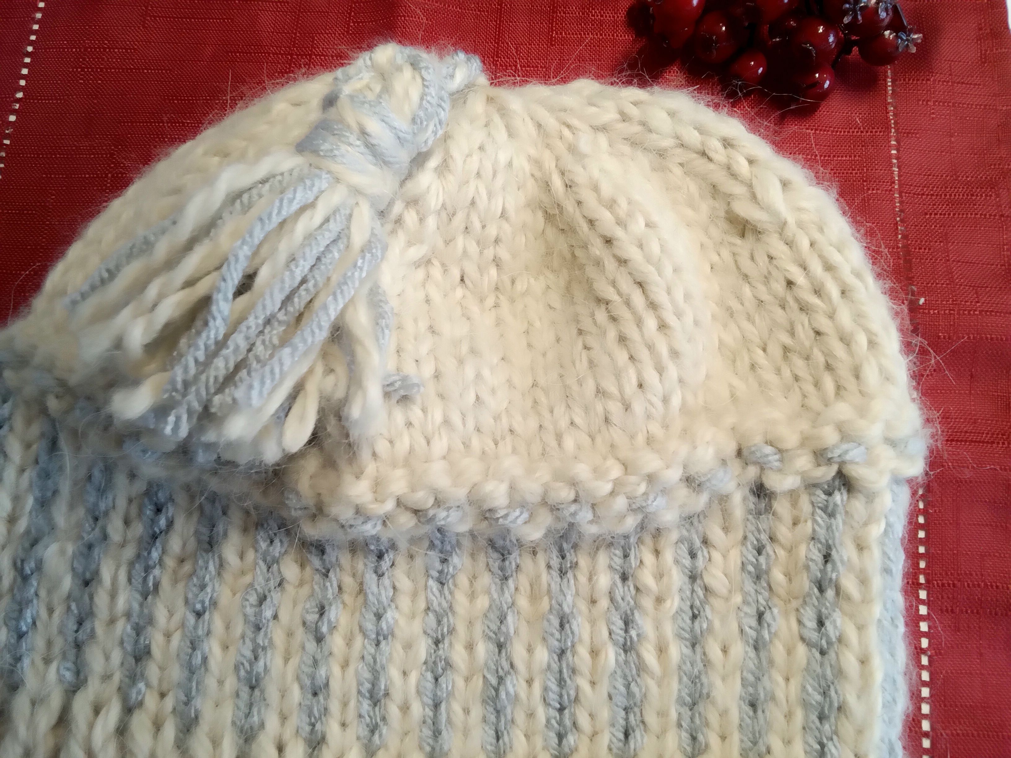 Hand knit beanie in premium chunky acrylic yarn, styled with a tassle 