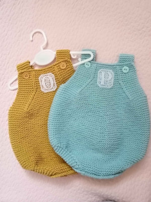 Handknitted baby romper and bonnet set 