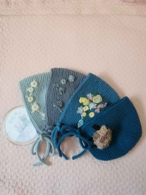 Hand embroidered baby bonnet
