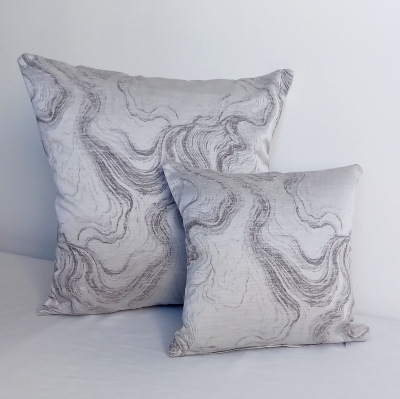 Pale grey marble effect cushion, available in two sizes