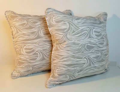 Grey wave design cushion with piping.  Soft grey, sofa cushion, chair cushion, office decor.