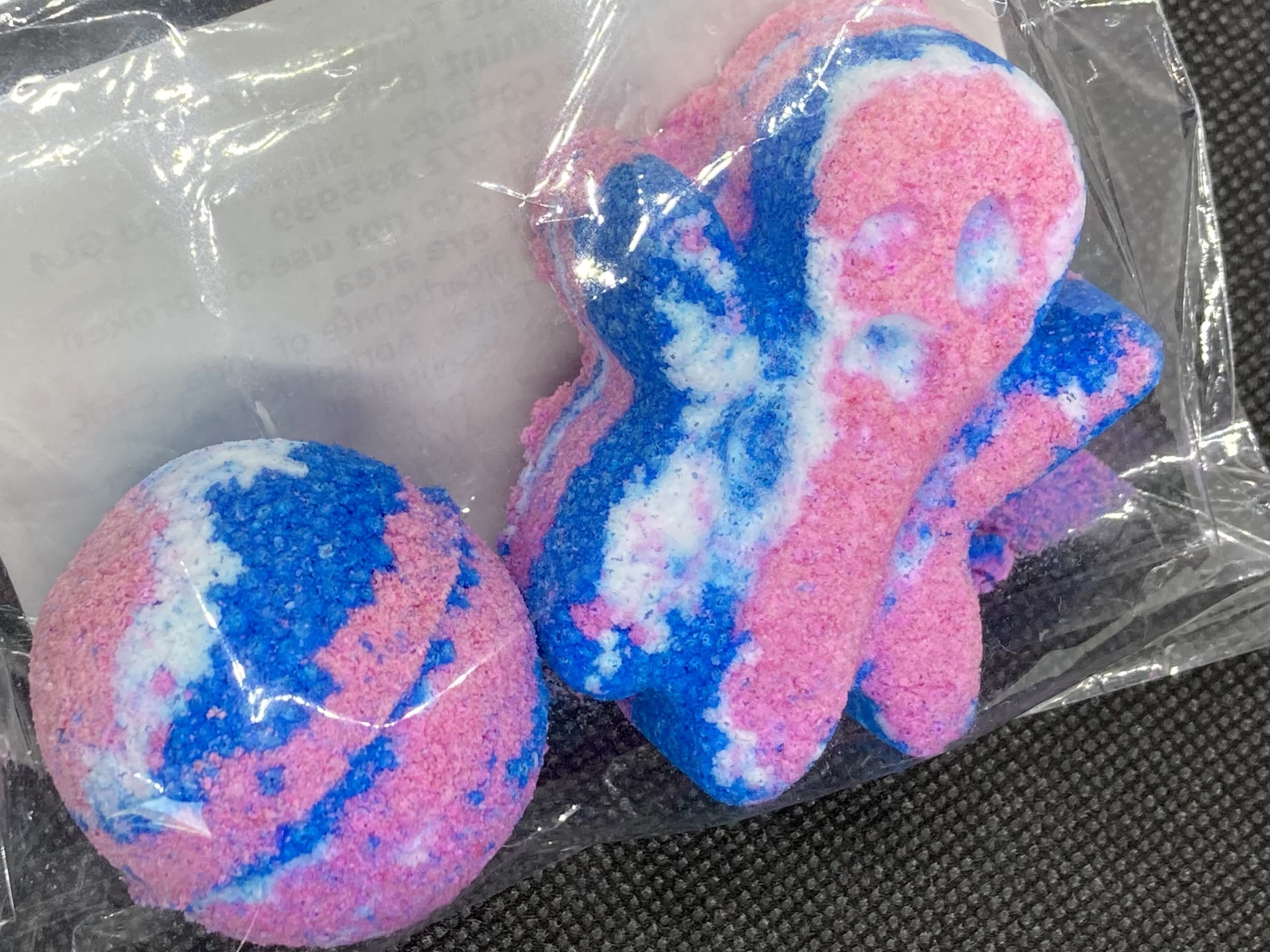 Handmade Vegan Foaming Halloween Bath Bomb - Essential oil Peppermint in pink, blue and white with water soluble colours 
