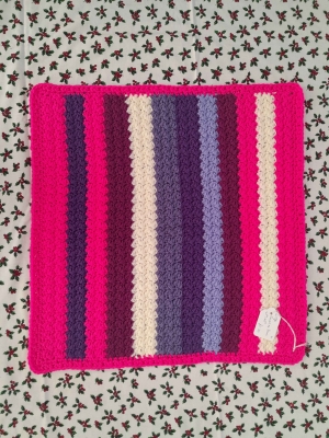 crocheted baby LapMat called Colour Me Spring 43cm x 42cm