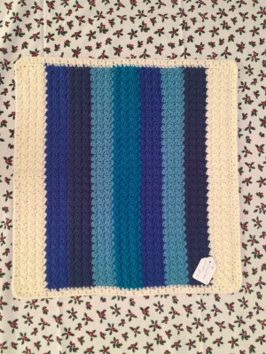 Baby crocheted LapMat called C'Mon you Blues 43cm x 42cm