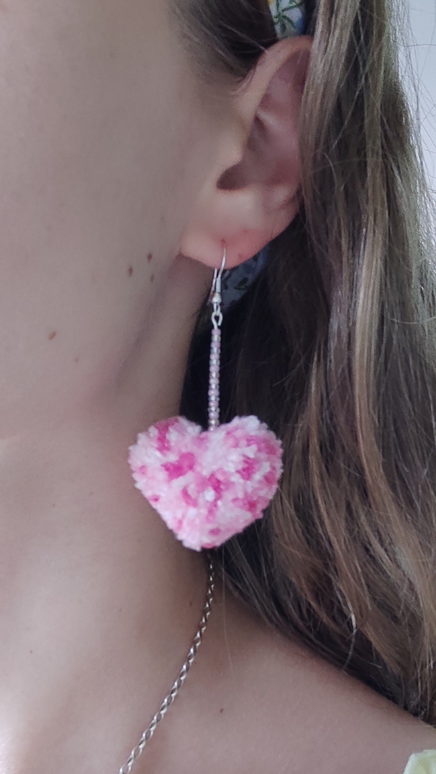 Heart shaped pom pom earrings on 925 sterling silver earring hooks