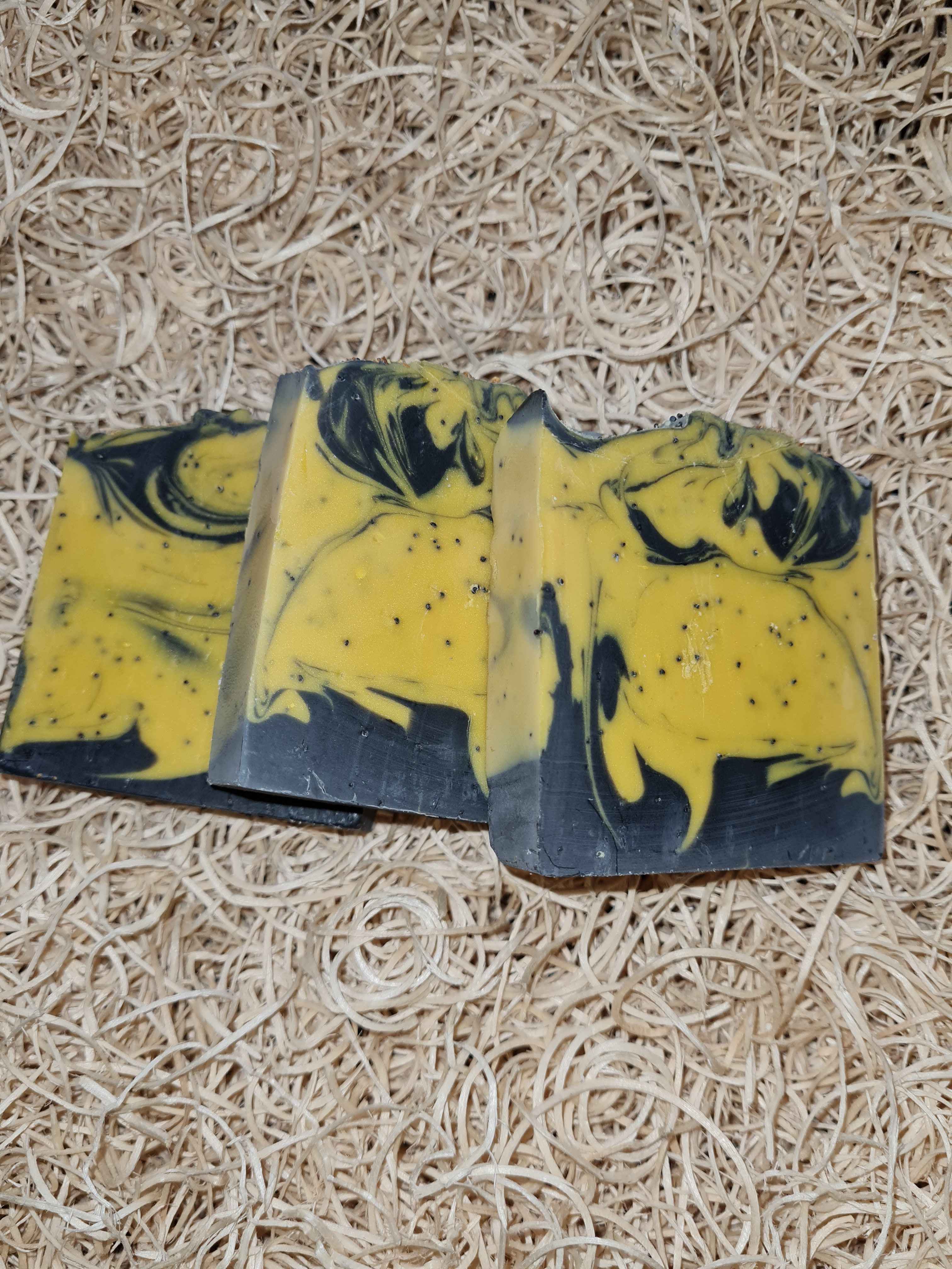 Goat's milk soap with Lemon essential oil, activated charcoal, Beeswax and poppy seeds 