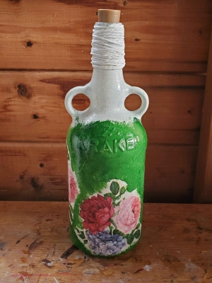 Spirit Bottle Light with Flower Design.
